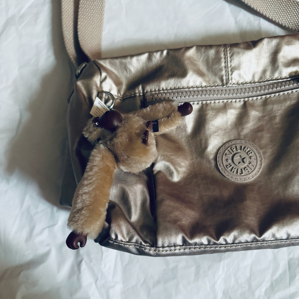 Kipling brand gold color crossbody bag